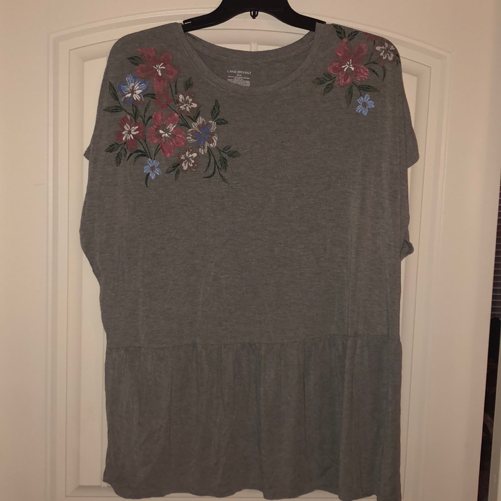 Grey peplum tee with floral detail